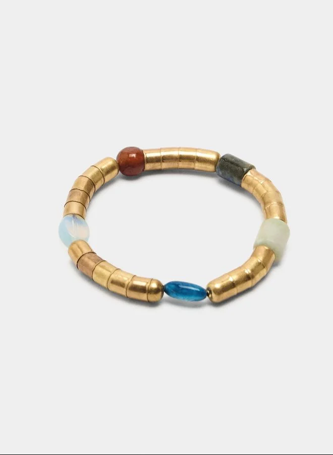 Set Of Elastic Bracelets With Stones