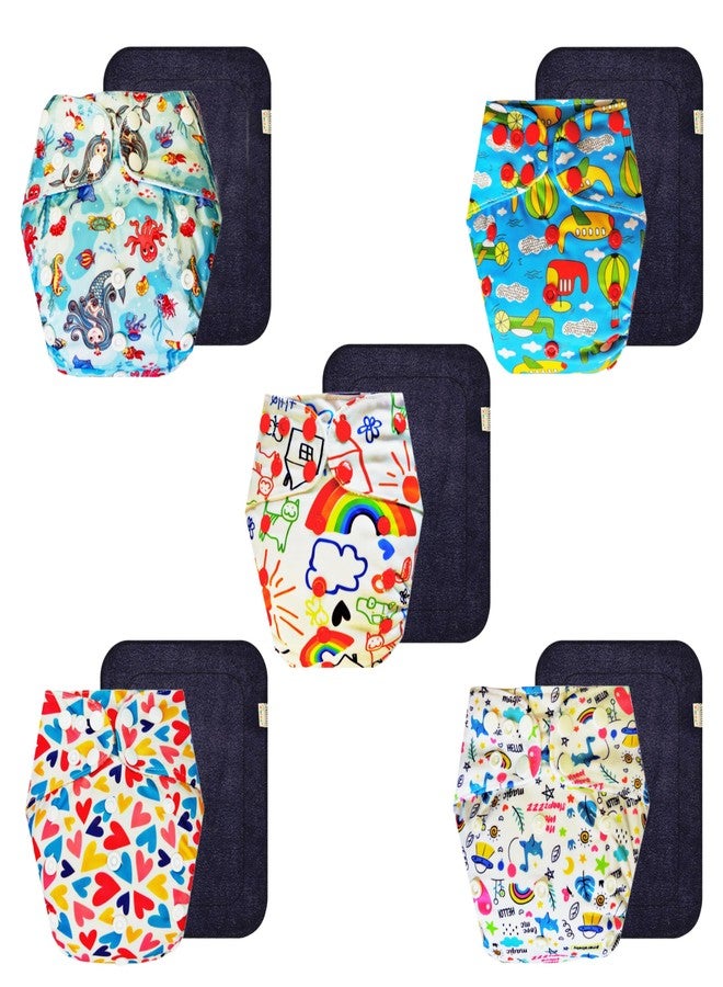 حفاضات قماشية فاخرة من دمبلدو مع حشوة سوداء (عبوة من 5) | مضادة للحساسية | تسمح بمرور الهواء | أزرار كبس قابلة للتعديل | مثالية لفصل الصيف الهندي | من 3 أشهر إلى 3 سنوات | مناسبة للجنسين - Image 1