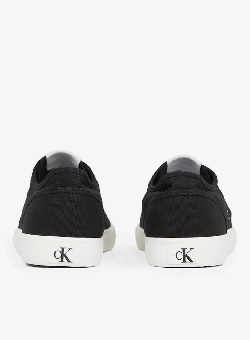 Calvin Klein Jeans Ck Black/Bright White Essential Vulcanised Canvas Low Sneakers for Men | Best Price UAE