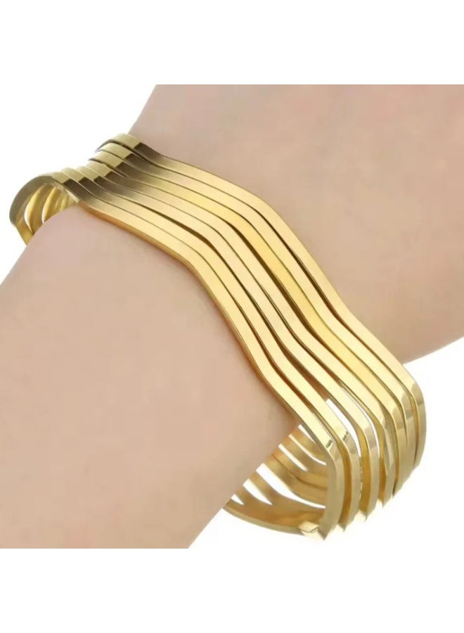 جوليا ستور مجموعة أساور متعرجة من الفولاذ المقاوم للصدأ مطلية بالذهب عيار 18 قيراطًا، أنيقة وعصرية وبسيطة لامعة، مجموعة أساور للنساء والفتيات، مجموعة من 6 قطع - Image 3