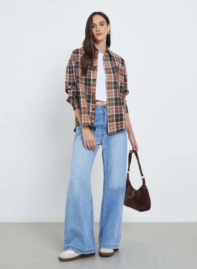 ستايلي بلوزة بطبعة مربعات مع تفاصيل جيب