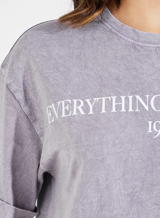 Styli Faded Wash Beauty Slogan T-Shirt with Turn-Up Sleeves