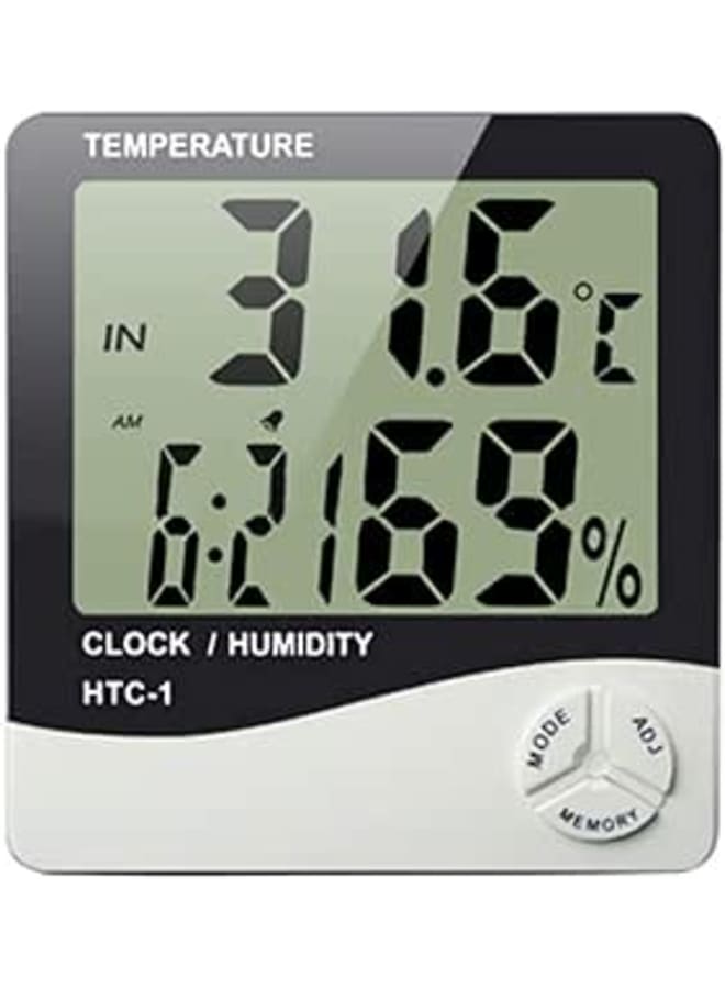Digital clock and alarm and a measure of the temperature and humidity Item No 439