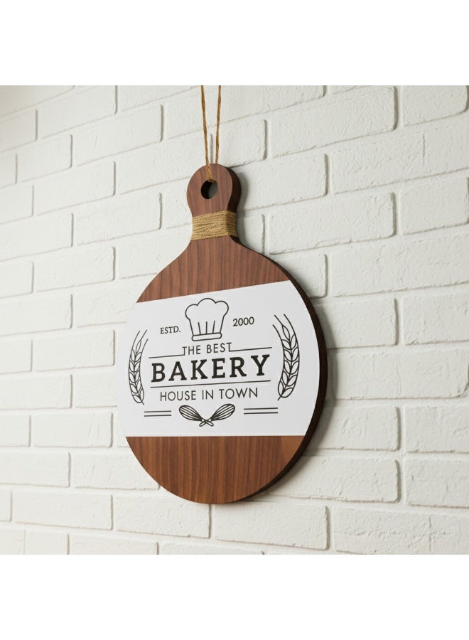 A unique wooden kitchen wall decoration featuring the word "Bakery," this decorative piece measures 21*32 cm in brown and white, crafted from 8 mm thick Spanish MDF wood to add beauty and elegance to your kitchen. - Image 1