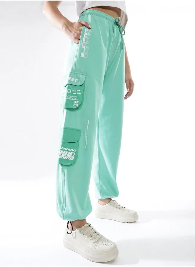 هوبرهولمي Women Track Pants in Multicolor featuring Jogger fit with a colourblocked pattern, no sleeves, regular length, secured with elasicated + drawstring closure, crafted from terry – a must-have for those who love trendy fashion.