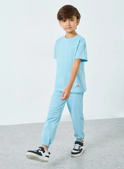 Styli Styli Boys Light Blue Solid T-Shirt and Joggers Set