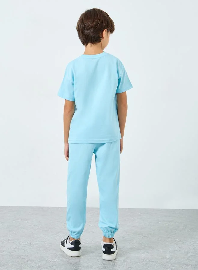 Styli Styli Boys Light Blue Solid T-Shirt and Joggers Set