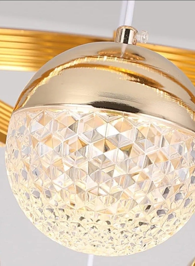 الثريات ثريا LED مودرن ذهبية 50 سم – تصميم فاخر بـ4 كرات إضاءة مع 3 ألوان (أبيض/دافئ/طبيعي) – ريموت كنترول – مثالية لغرفة المعيشة - Image 3