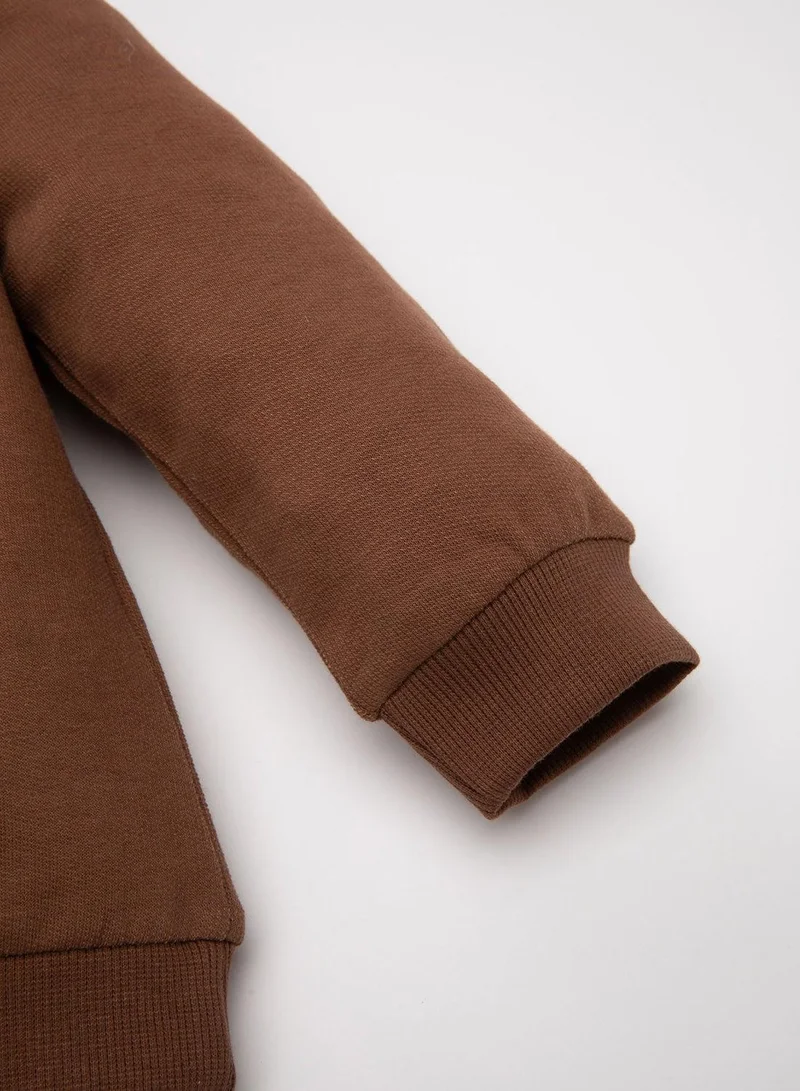 DeFacto  Brown Regular Fit Crew Neck Slogan Printed Soft Fleece-Lined Thin Sweatshirt  | Best Price UAE