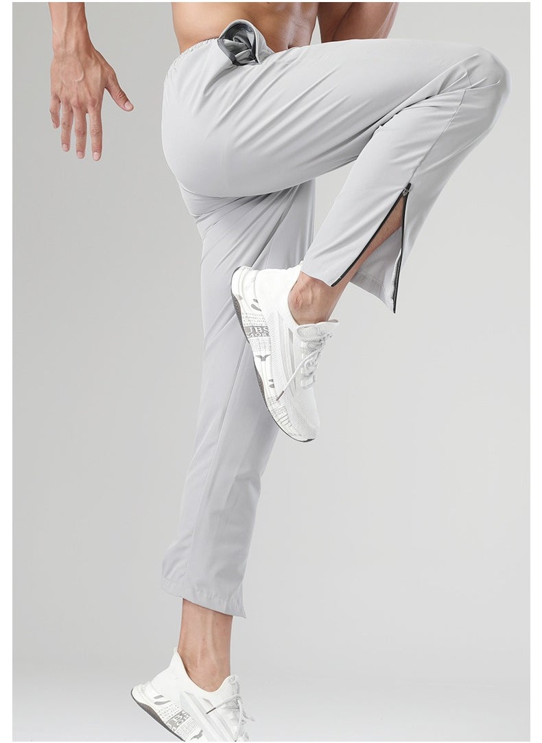 UTDOORWEAR - بنطال رياضي رجالي للربيع والخريف فائق النحافة وسريع الجفاف ورياضي للجري واللياقة البدنية - Image 1