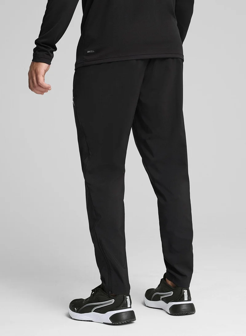 بوما سراويل رجالية مدببة منسوجة من تاد إسنشالز