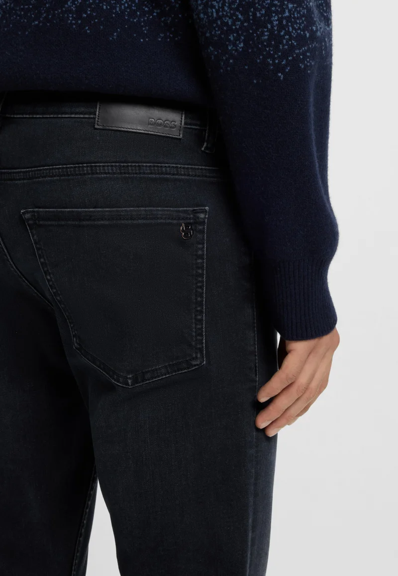 BOSS Delaware slim-fit jeans in blue-black soft-motion denim