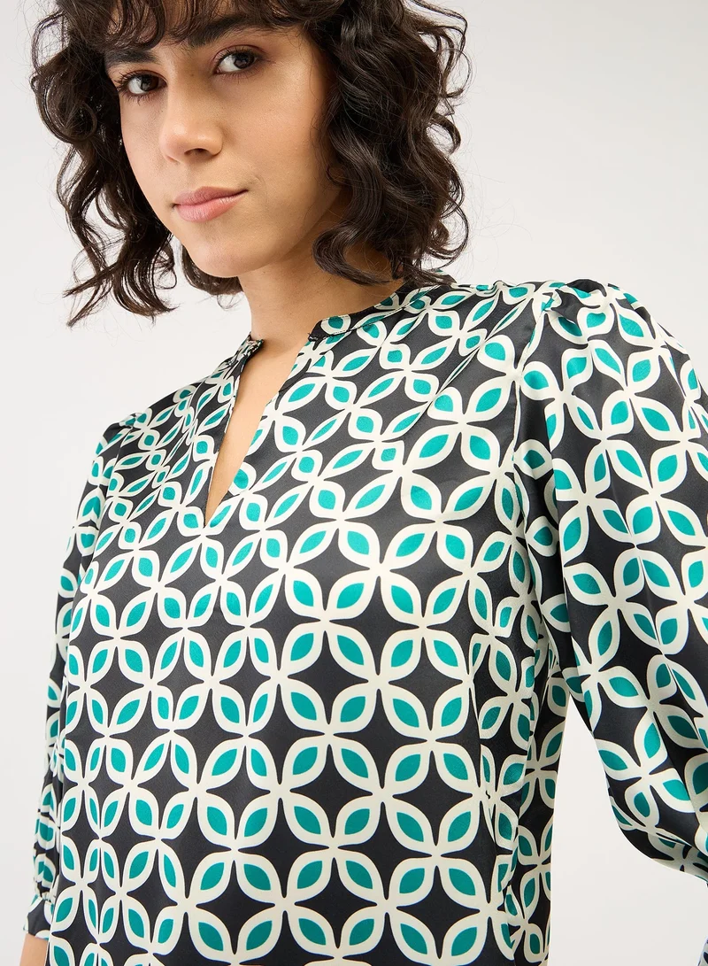 سولت اتاير Women's Fashionable Multi-Color Geometric Pattern Top Featuring a Stylish Collared V Neckline and Trendy 3/4th Length Puffed Sleeves Ideal for Effortless Chic and Versatile Everyday Wear