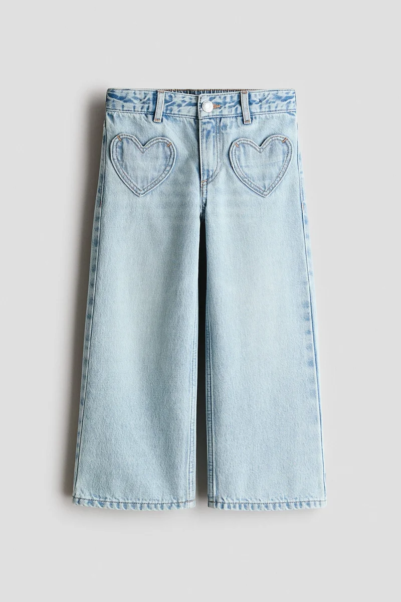 اتش اند ام بنطلون جينز بأرجل واسعة وتفاصيل مطبوعة