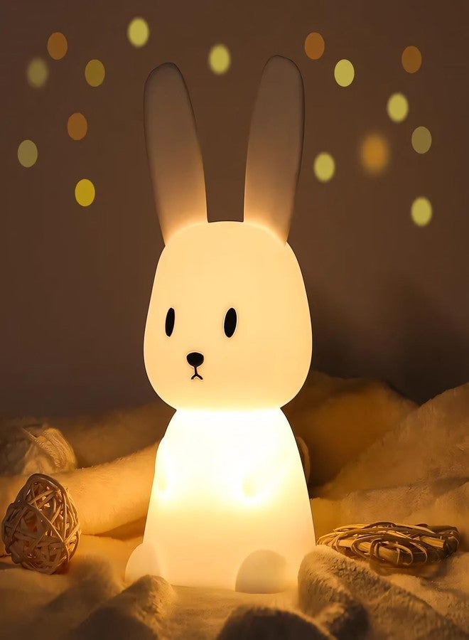 One94Store مصباح ليلي للأطفال من ون 94 ستور، على شكل أرنب من السيليكون الناعم، مزود بإضاءة LED، 7 أوضاع لتغيير الألوان، قابل لإعادة الشحن عبر منفذ USB، تحكم باللمس، مصباح ليلي للأطفال الرضع والصغار، ديكور غرفة نوم الأطفال، متعدد الألوان - Image 1