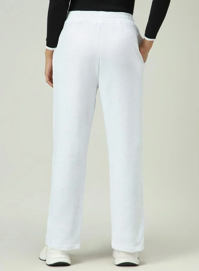 أوجيدر بنطال سادة بتفاصيل بارزة الملمس