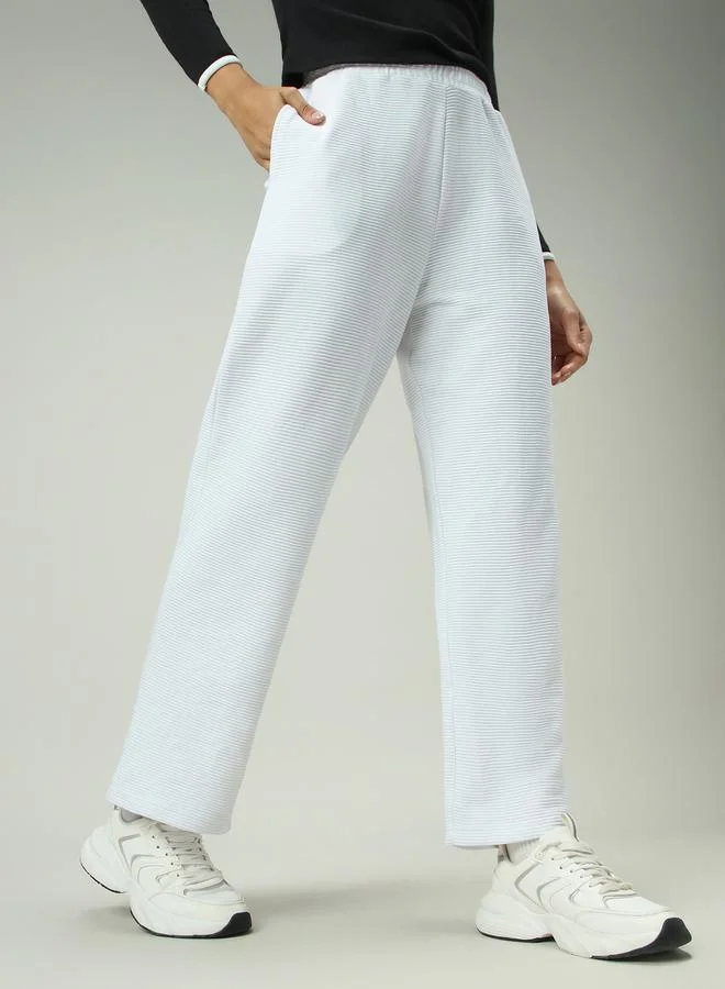 أوجيدر بنطال سادة بتفاصيل بارزة الملمس