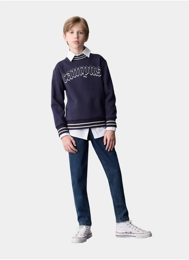 ديفاكتو Carrot Fit High Rise Straight Leg Jeans by Styli