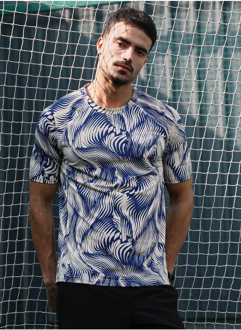 Campus Sutra Campus Sutra Men's Indigo Blue & Cream White Abstract-Stroke Activewear T-Shirt For Casual Wear | Crew Neck | Short Sleeves | Jersey T-Shirt Crafted With Comfort Fit For Everyday Wear