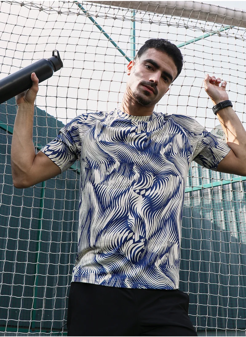 Campus Sutra Campus Sutra Men's Indigo Blue & Cream White Abstract-Stroke Activewear T-Shirt For Casual Wear | Crew Neck | Short Sleeves | Jersey T-Shirt Crafted With Comfort Fit For Everyday Wear