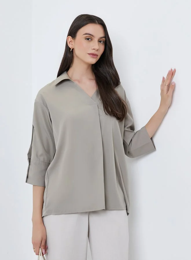 تايك تو بلوزة سادة بتفاصيل كسرات