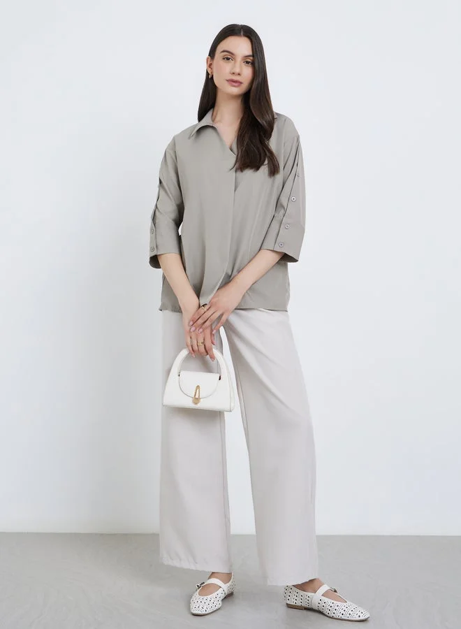 تايك تو بلوزة سادة بتفاصيل كسرات