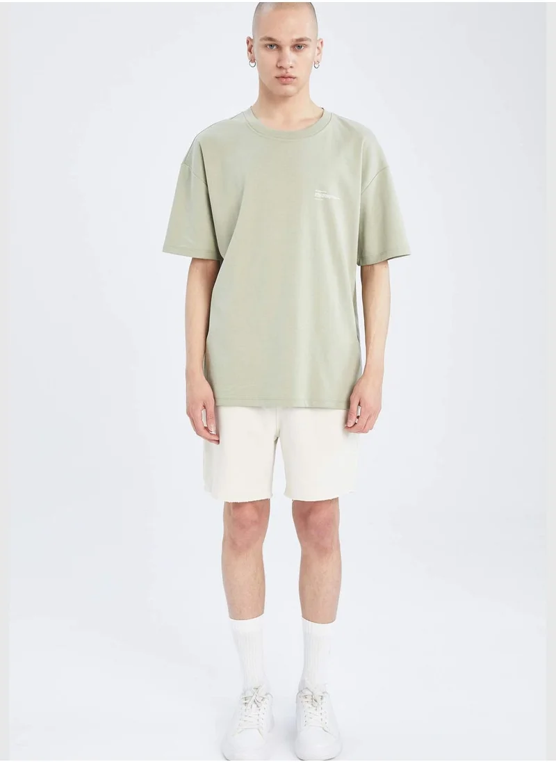 ديفاكتو Boxy Fit Short Sleeve Minimal Print T-Shirt