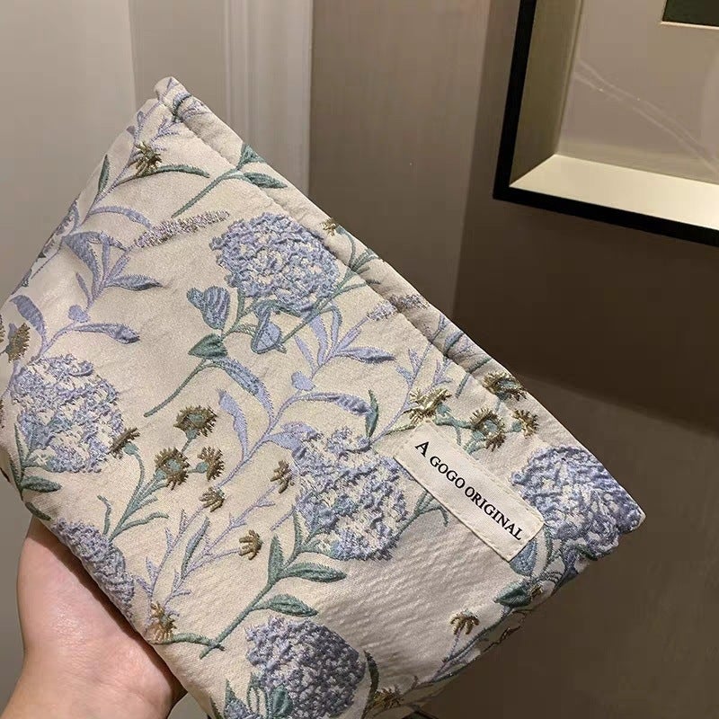 Ins Cream Embroidered Flower Cosmetic Bag Large Capacity Lotion Storage Bag Portable Hand Bag - Image 3