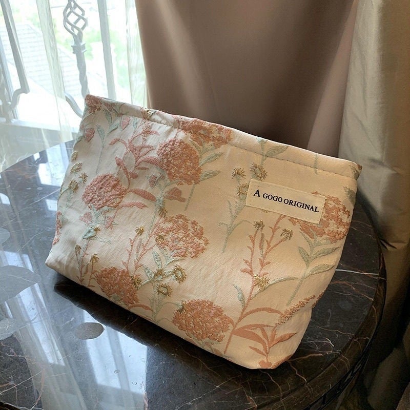Ins Cream Embroidered Flower Cosmetic Bag Large Capacity Lotion Storage Bag Portable Hand Bag - Image 4