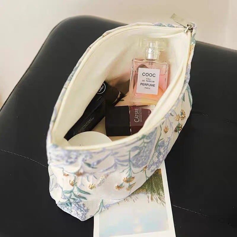 Ins Cream Embroidered Flower Cosmetic Bag Large Capacity Lotion Storage Bag Portable Hand Bag - Image 1