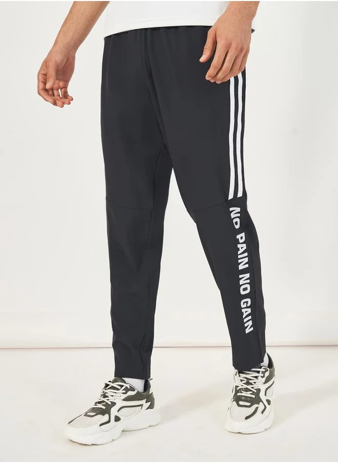 Styli Super Stretch Slogan Print Track Pants