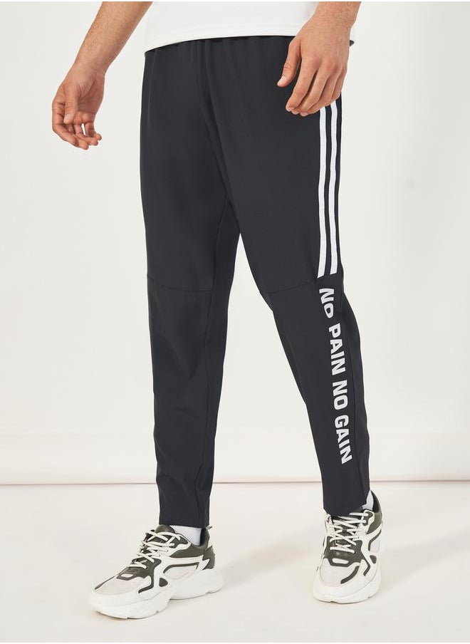 Styli Super Stretch Slogan Print Track Pants  - Image 3