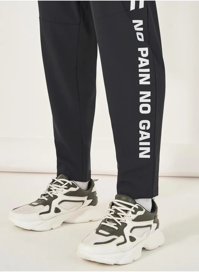 Styli Super Stretch Slogan Print Track Pants