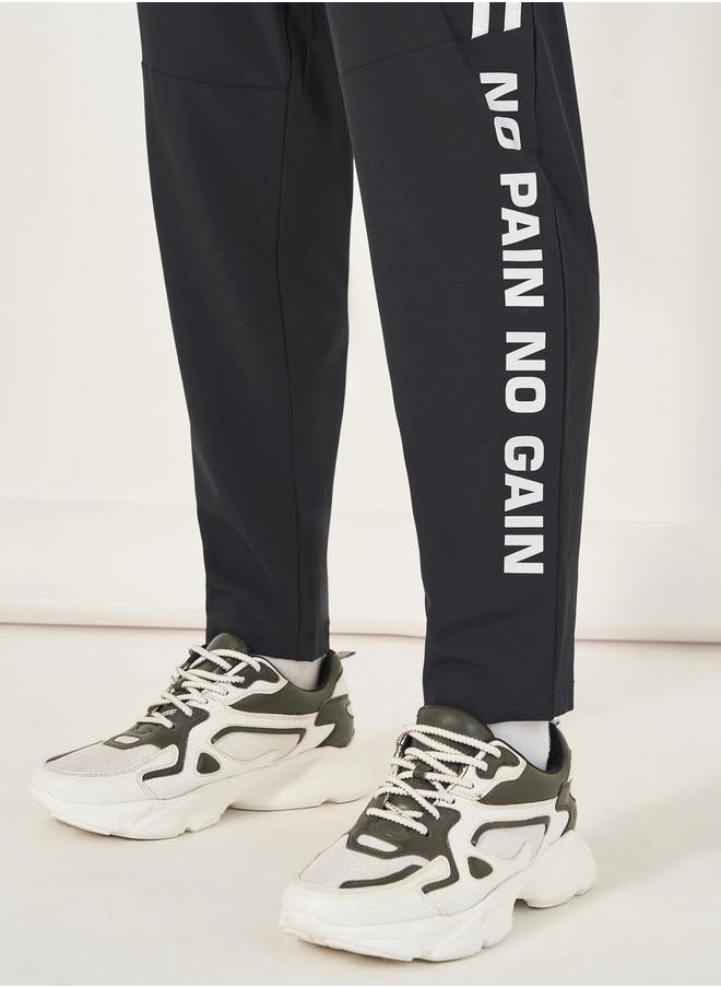 Styli Super Stretch Slogan Print Track Pants  - Image 4
