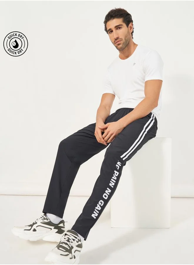 Styli Super Stretch Slogan Print Track Pants