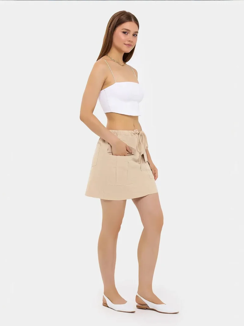 زوبعة تنورة قطنية قصيرة بخصر منخفض وجيوب