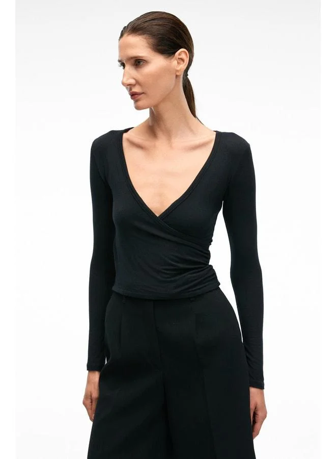 GRIMELANGE CALLORIA Women's V-Neck Long Sleeve Slim Fit Black Blouse.