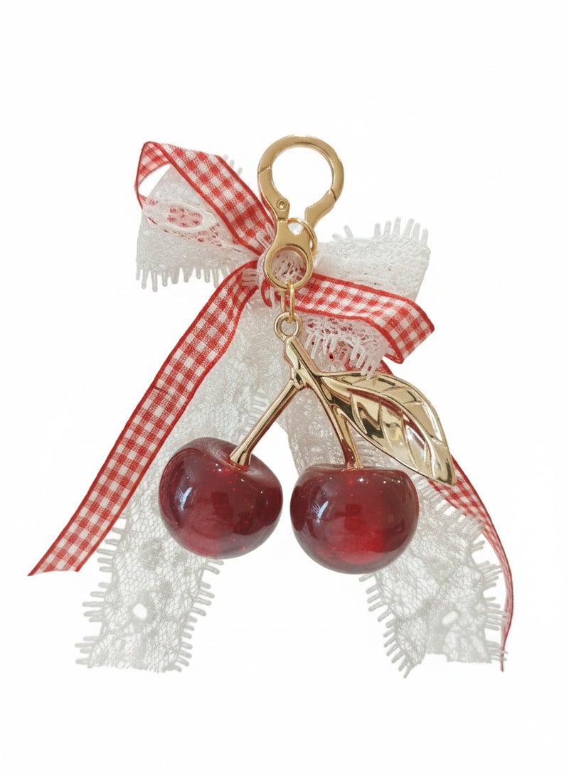 تعليقة وميدالية كرز أحمر لامع بفيونكة قماش ودانتيل فاخر - Image 1