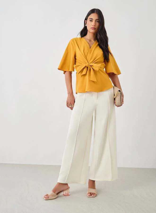 ستايلي Styli Solid V-Neck Tie-Up Waist Blouse