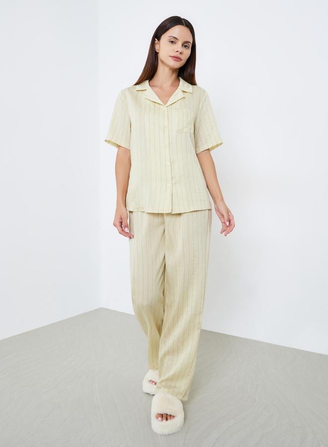 A pajama set of pants and a blouse, viscose stripe...