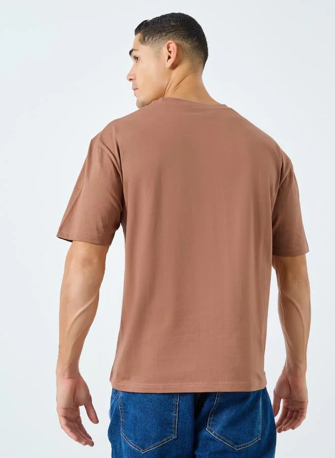 Styli Styli Men Oversized Slogan Print T-Shirt