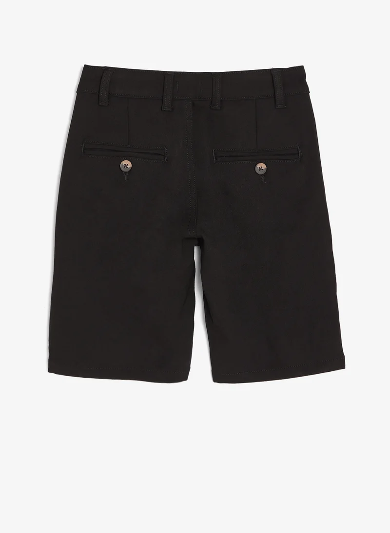 ريبلز مع نمشي Boys Chino Shorts