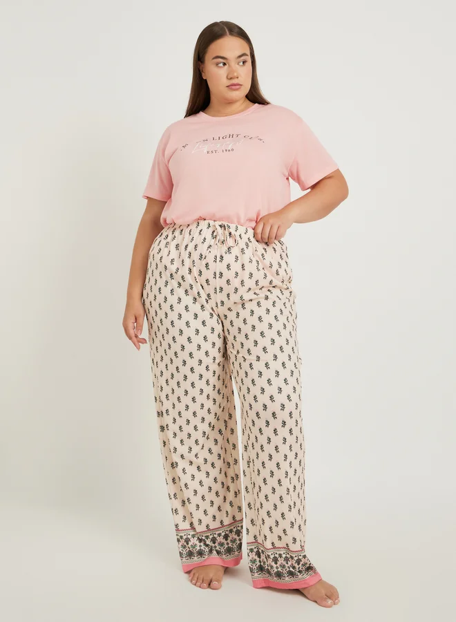 Styli Slogan Print Dropped Shoulder T-Shirt and All-Over Print Pyjama Set