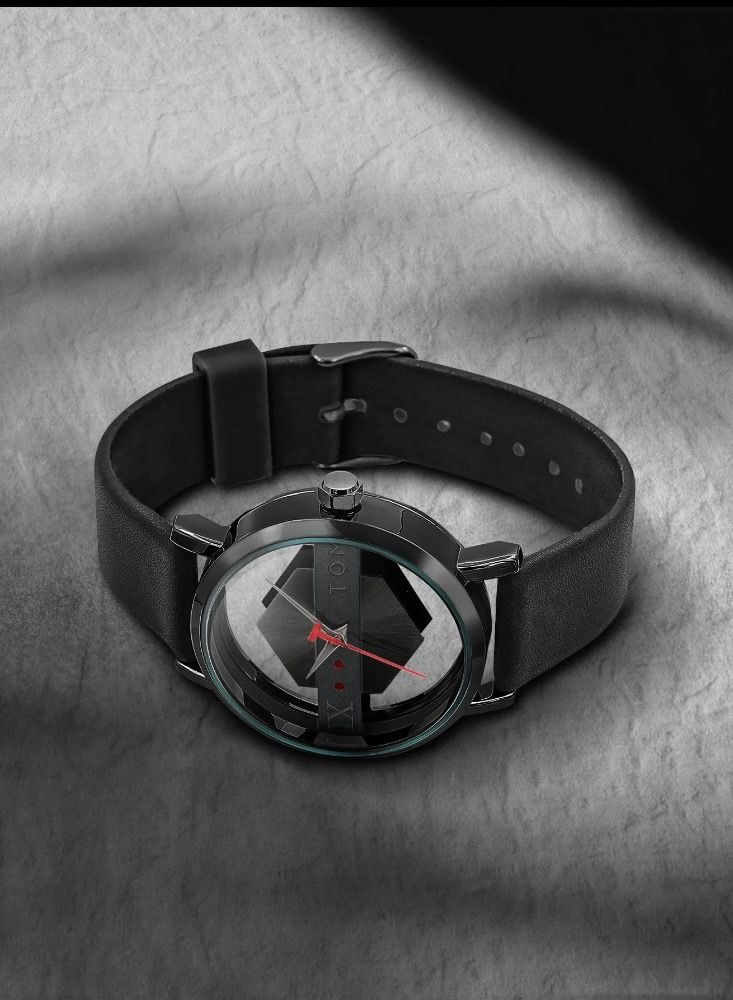 TOMI A stylish unisex wrist watch from TOMI with a black leather strap for men and women from TOMI, the watch face size is 40 mm and the thickness is 9 mm - Image 3