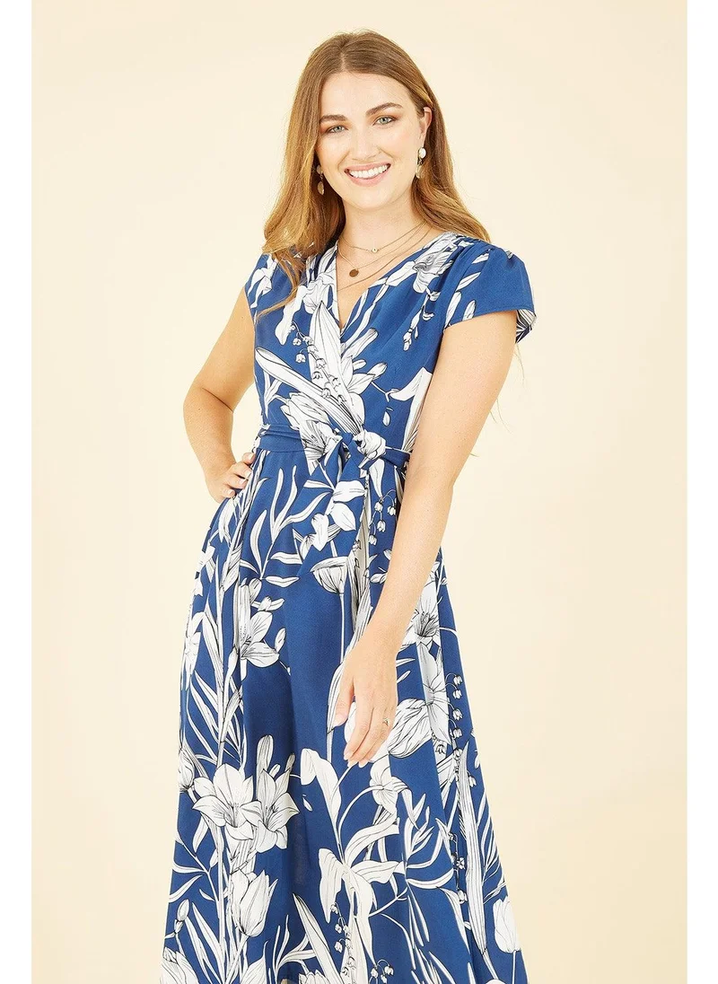 MELA LONDON Leaf Print Dipped Hem Wrap Dress