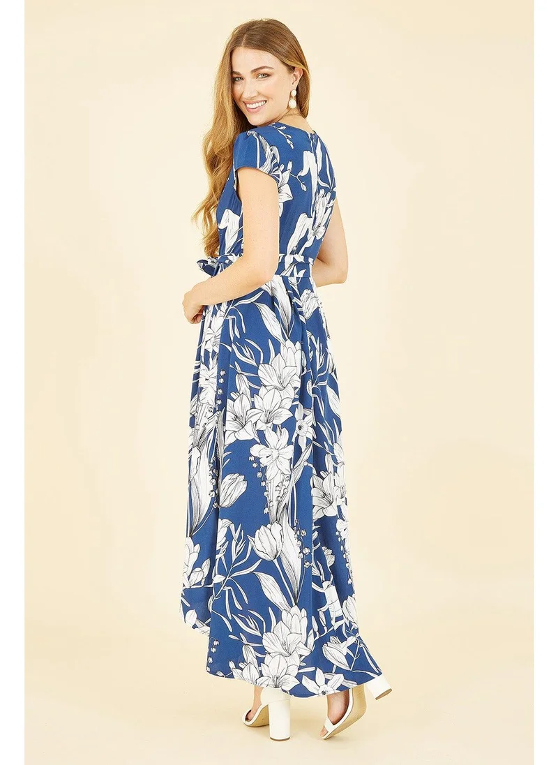 MELA LONDON Leaf Print Dipped Hem Wrap Dress