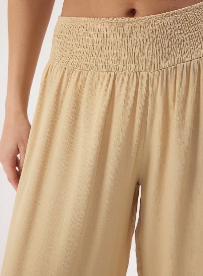 trendyol Ecru Woven Gipe Detailed Beach Trousers - Image 3