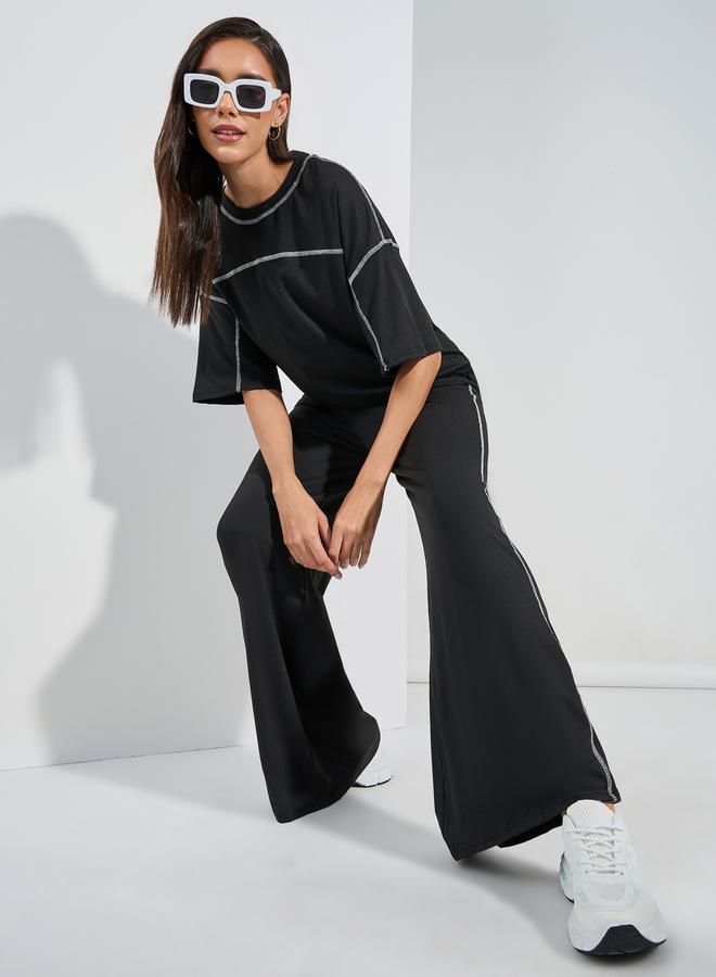 Styli Contrast Overlock Oversized T-Shirt & Wide Leg Joggers Co-Ords  - Image 1