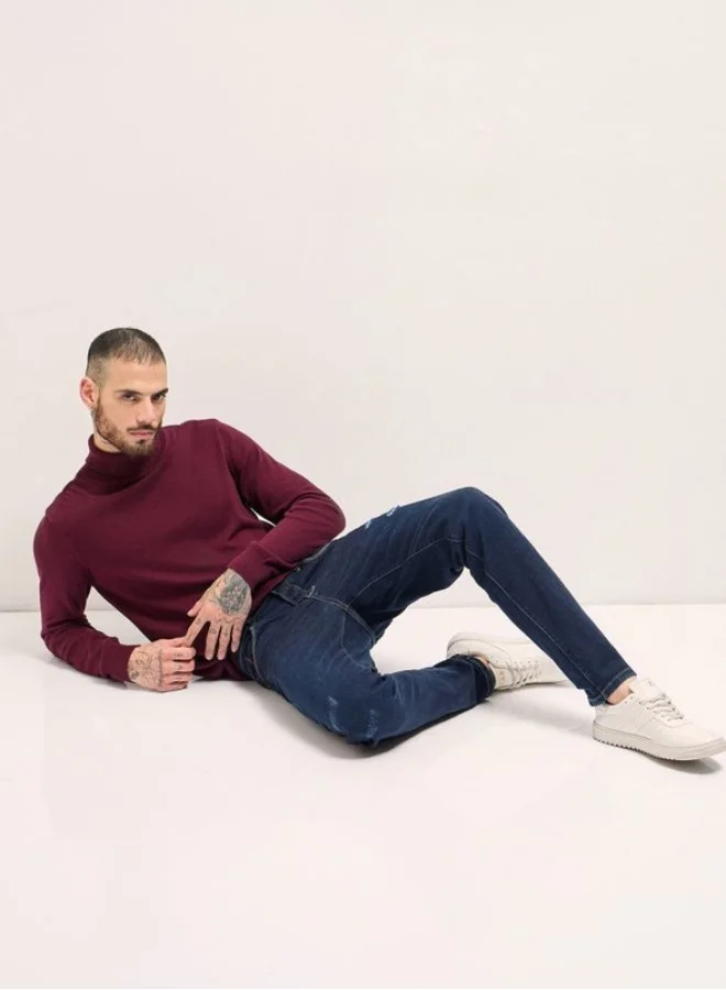 The Bear House  Men's Dark Blue distressing and rip Mid-Rise Slim Fit Jeans Classic Comfort With Modern Style, Perfect For Everyday Casual Looks And Effortless Streetwear Vibes for Men | Best Price UAE