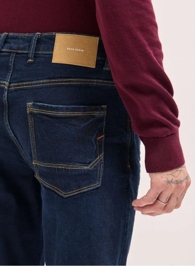 The Bear House  Men's Dark Blue distressing and rip Mid-Rise Slim Fit Jeans Classic Comfort With Modern Style, Perfect For Everyday Casual Looks And Effortless Streetwear Vibes for Men | Best Price UAE